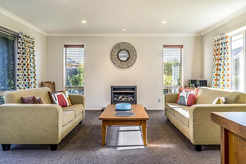 Living room Modern Apartment with Two Identical Sofas